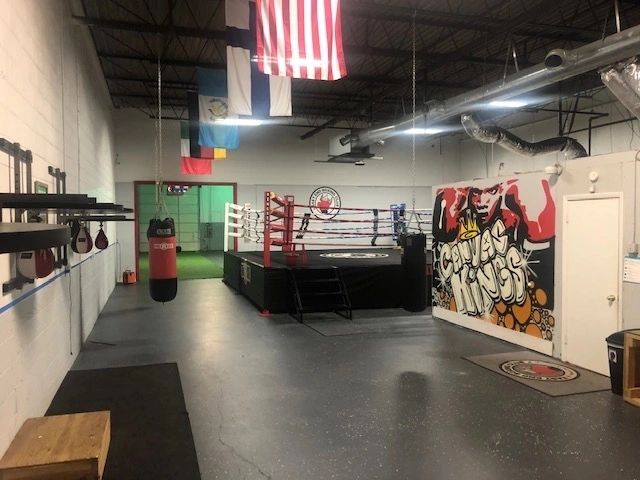 The East End Boxing Club ring and mural wall